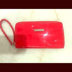 Mango red patent clutch